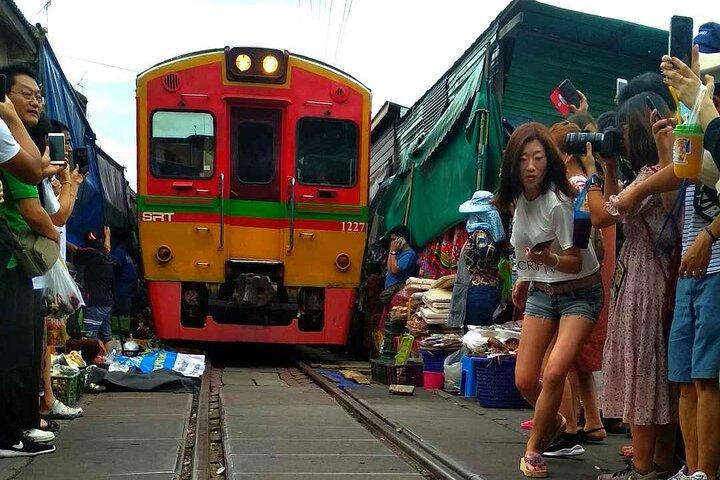 Damnoen Saduak Floating Market & Maeklong Train Market Tour