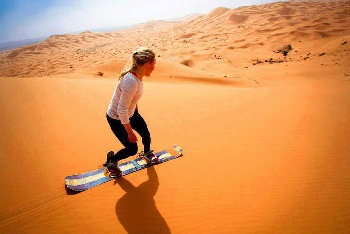 Morning Red Dune Safari with Camel Trekking and sand boarding