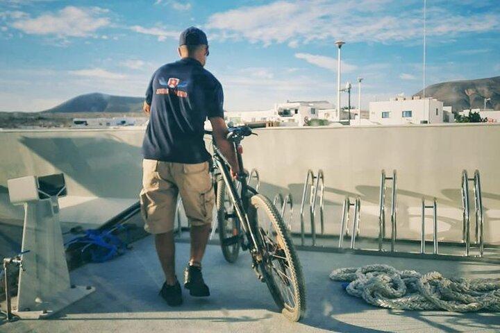 Lanzarote:Return ferry ticket to La Graciosa. Free wifi & parking