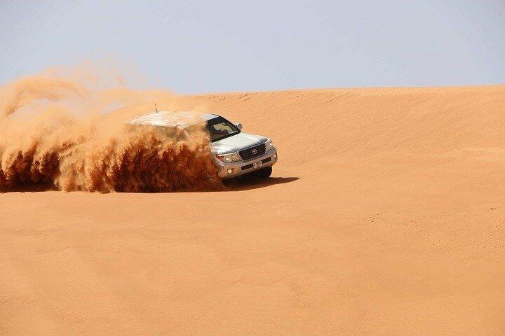 Dubai Desert Safari Red Dune: BBQ, Camel Ride & Sandboarding