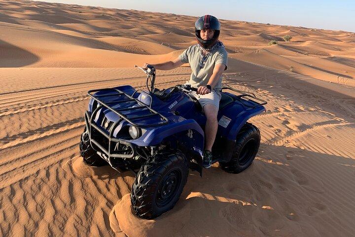 Self-drive Quad Bike with Sand Boarding and Camel Ride in Dubai