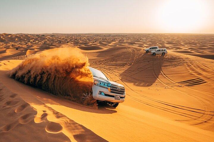 Dubai Desert Safari with ATV(optional)& Sandboarding Experience with BBQ Dinner