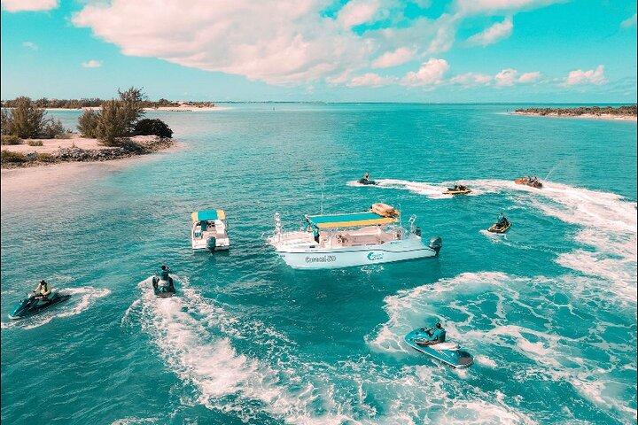 Jet Skiing around La famille ship and smaller pristine cays 2hr
