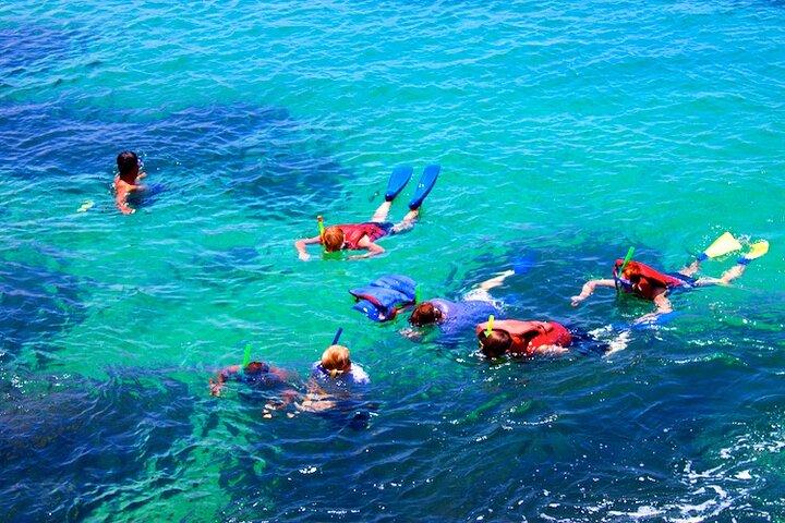 Amazing tour boat through wild nature in Huatulco Bays