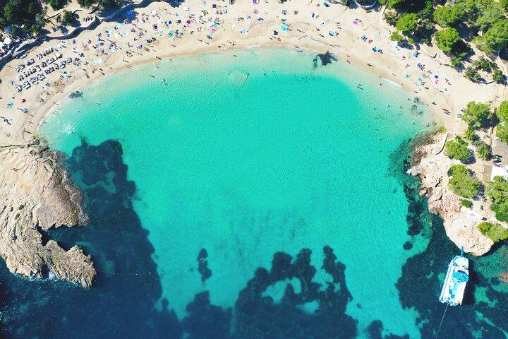 Sunset Beach Hopping Cruise, Cala Comte and Cala Bassa, SUP and snorkelling
