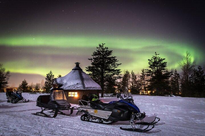 Levi Northern lights by snowmobile