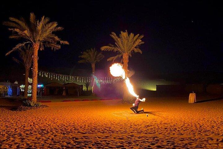 One hour Quad Bike at Red Sand Desert Safari with Camel Ride and BBQ Dinner