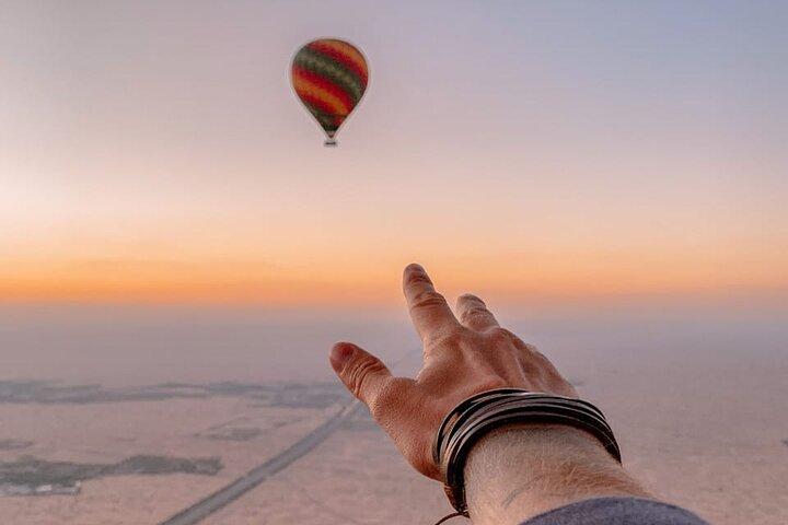 Sunrise Hot Air Balloon Ride in Dubai with Breakfast, Camel ride, and More