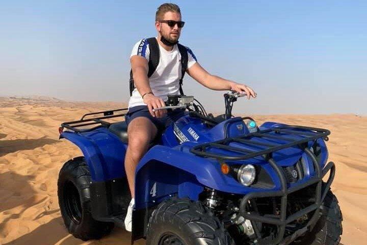 Guided Desert Quad Safari with Camelride, BBQ-Dinner and live-Shows