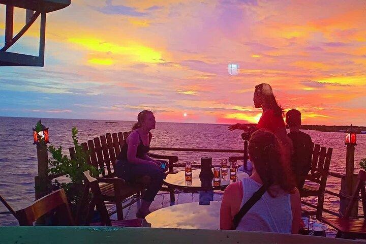 Sunset Dinner and drinks includes a Floating Village cruise tour.