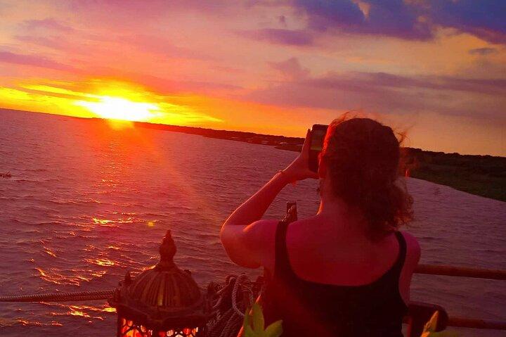 Sunset Dinner and drinks includes a Floating Village cruise tour.