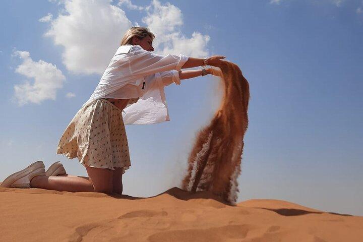 Evening Desert Safari in Dubai with Dune Bashing , Camel Ride and BBQ Dinner