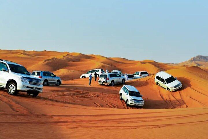 Overnight Red Dunes Desert Safari - Dune Bashing, BBQ Dinner & Morning Breakfast