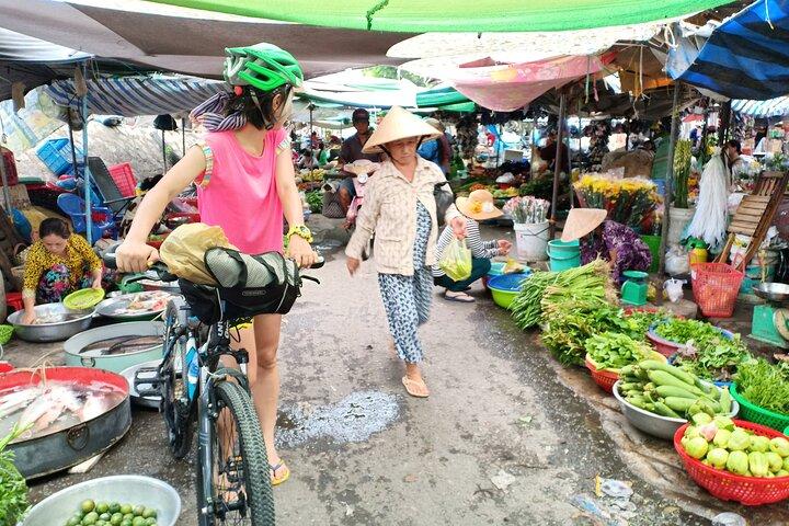 Two Days Off the Beaten Path the Mekong by Bike and Boat.