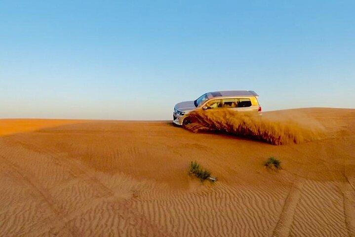 Dubai Quad Bike Tour with Camel Ride and BBQ Dinner