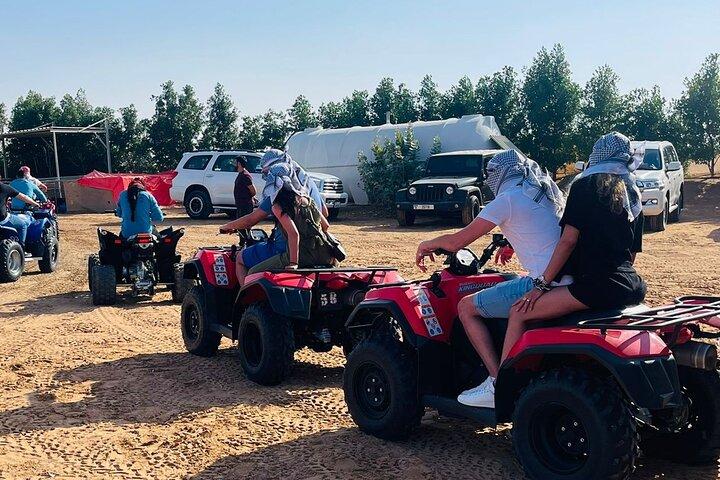 Dubai Evening Desert Safari with Quad Bike, Camel Ride and BBQ