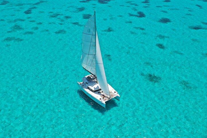 Platinum Catamaran to Isla Mujeres: Snorkel & Open Bar