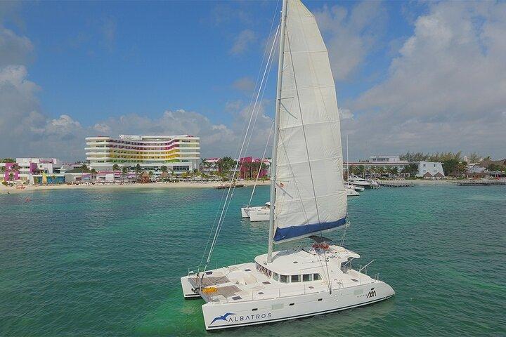 Platinum Catamaran to Isla Mujeres: Snorkel & Open Bar