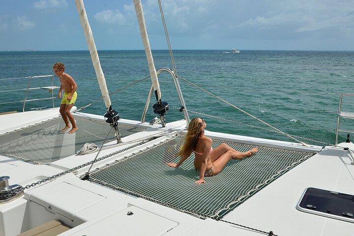 Platinum Catamaran to Isla Mujeres: Snorkel & Open Bar
