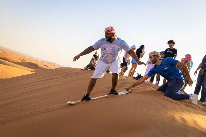 Dubai Red Dunes with Sandboarding, Camel Ride, Falcon & VIP Camp
