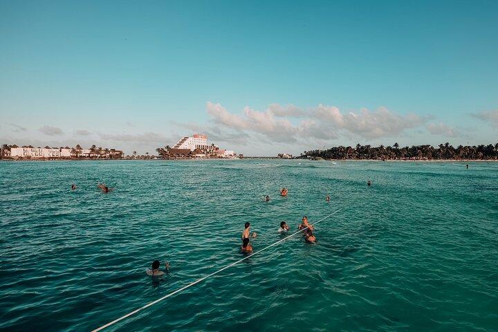 Sunset Catamaran to Isla Mujeres + Transportation from Cancún