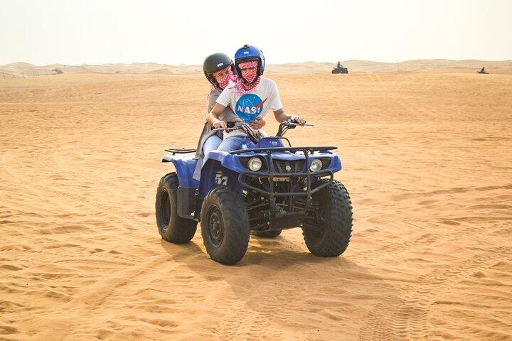 Evening Desert Safari with Quad Bike, BBQ Dinner and Camel Ride