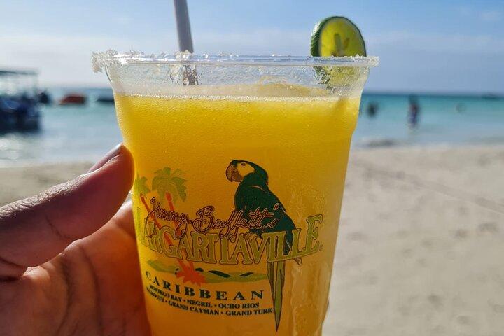Negril Seven Mile beach, Catamaran Cruise ,Parasailing,with Sunset at Ricks Cafe
