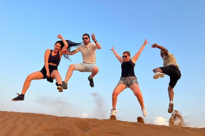 Private Evening Desert Safari with BBQ Dinner, Camel Ride And Sand Boarding