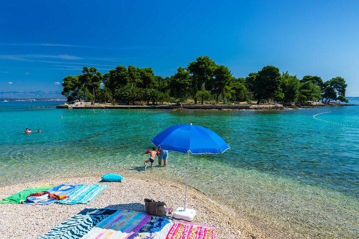 Visit 2 Islands of Zadar on a traditional wooden boat during half-day trip