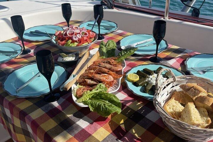 Luxury Catamaran Semi private cruise with meals & drinks and transportation.