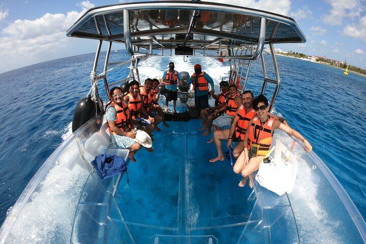 Excursion to Reefs in a transparent boat from Cancun