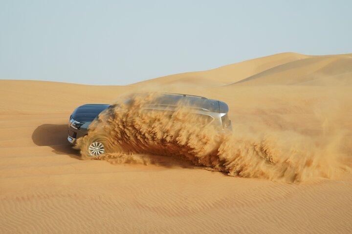 Dubai Desert Safari with 4x4 Cars, Live BBQ, Shows & Much more