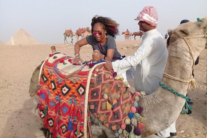 Sunrise or Sunset at Giza pyramids by horse or camel