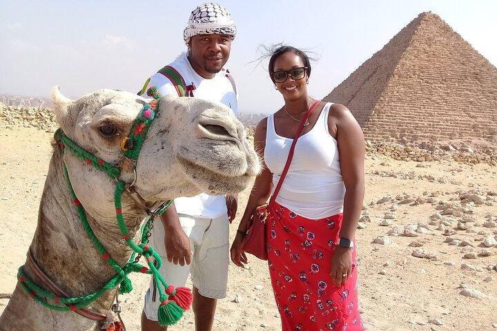 Sunrise or Sunset at Giza pyramids by horse or camel
