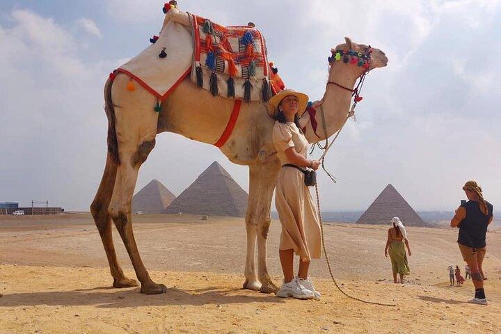 Giza pyramids and sphinx private Tour- camel ride, lunch ,shopping tour