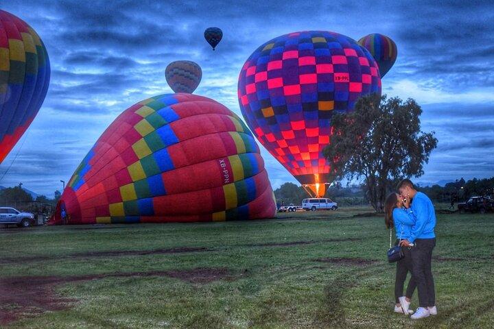Sunrise HotAir Balloon Adventure Over Teotihuacan's Pyramids