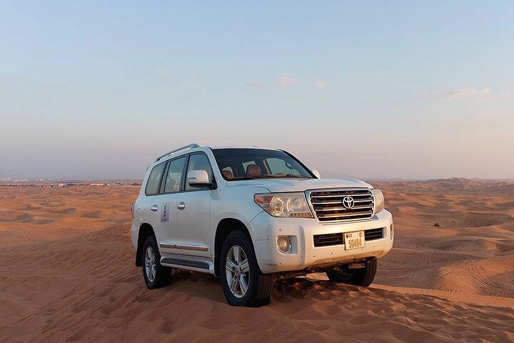 Red Dune Bashing with Camel Ride Sandboard Sunset Pictures & BBQ Dinner