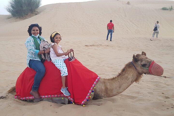 Red Dune Bashing with Quad Bike Sandboard Camel Ride & BBQ Dinner