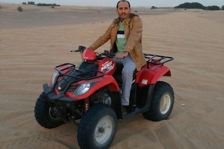 Red Dune Bashing with Quad Bike Sandboard Camel Ride & BBQ Dinner