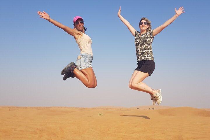Red Dune Bashing with Quad Bike Sandboard Camel Ride & BBQ Dinner