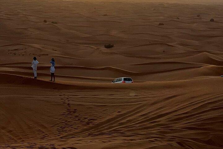 Morning Desert Safari with Dune Bashing, Camel Ride, Sand Board & Quad Biking
