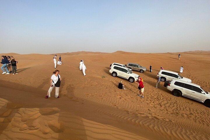 Morning Desert Safari with Dune Bashing, Camel Ride, Sand Board & Quad Biking