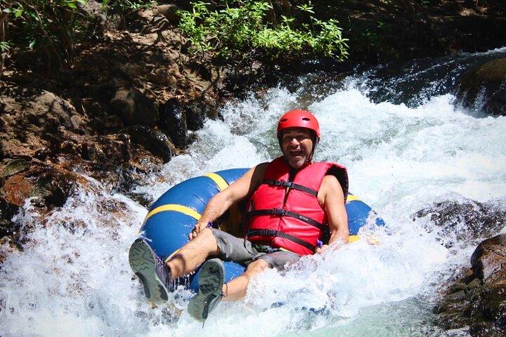 La leona waterfall hike & river tubing full day