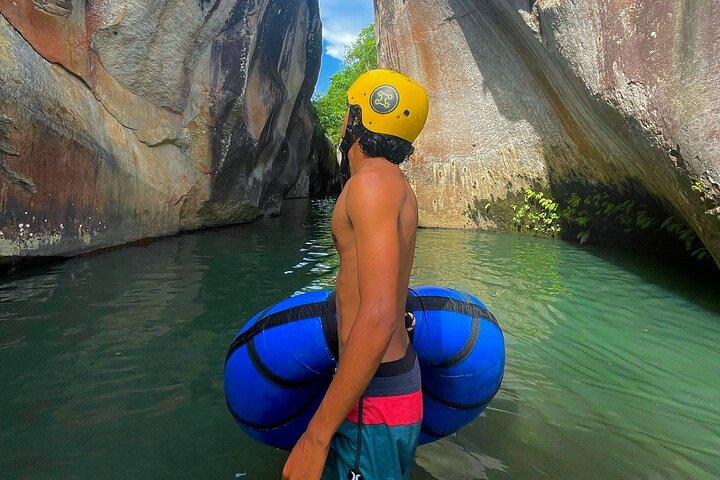 La leona waterfall hike & river tubing full day