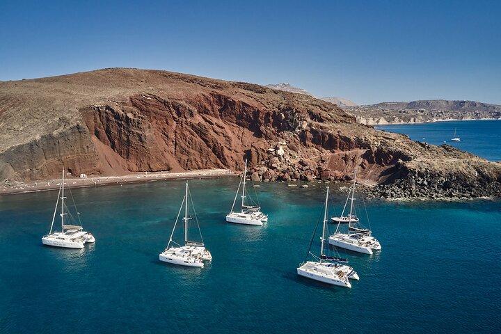 Santorini: Small Group Catamaran Cruise with BBQ Fish & Drinks