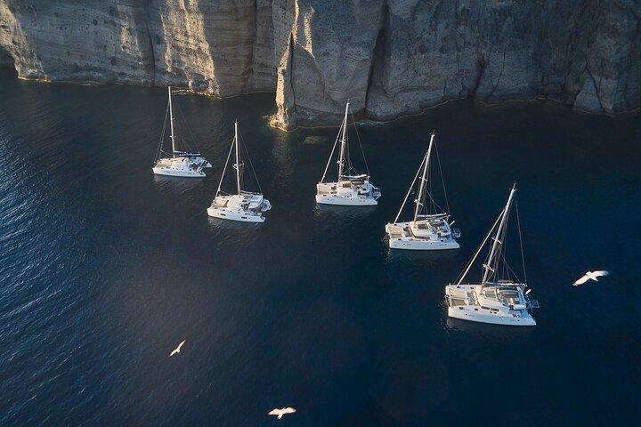 Santorini: Small Group Catamaran Cruise with BBQ Fish & Drinks