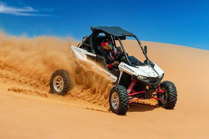 Dune Buggy Ride with Camel Rides, Sand Boarding with Free Pickup from Dubai
