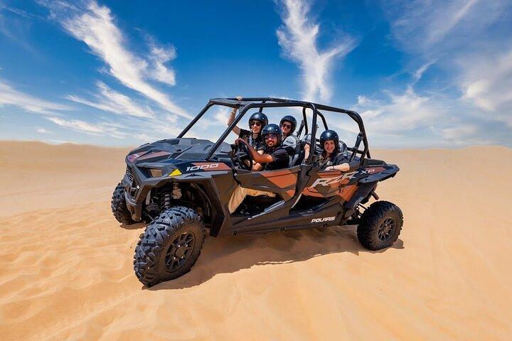 Dune Buggy Ride with Camel Rides, Sand Boarding with Free Pickup from Dubai