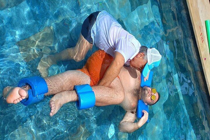 1-Hour of osteopathy in the swimming pool in Marrakech.
