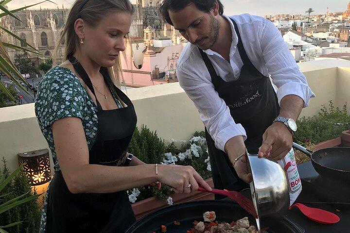 Seville: Small Group Rooftop Paella Class with Sangria Pairing